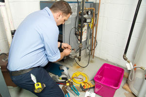 Worker repairing furnace